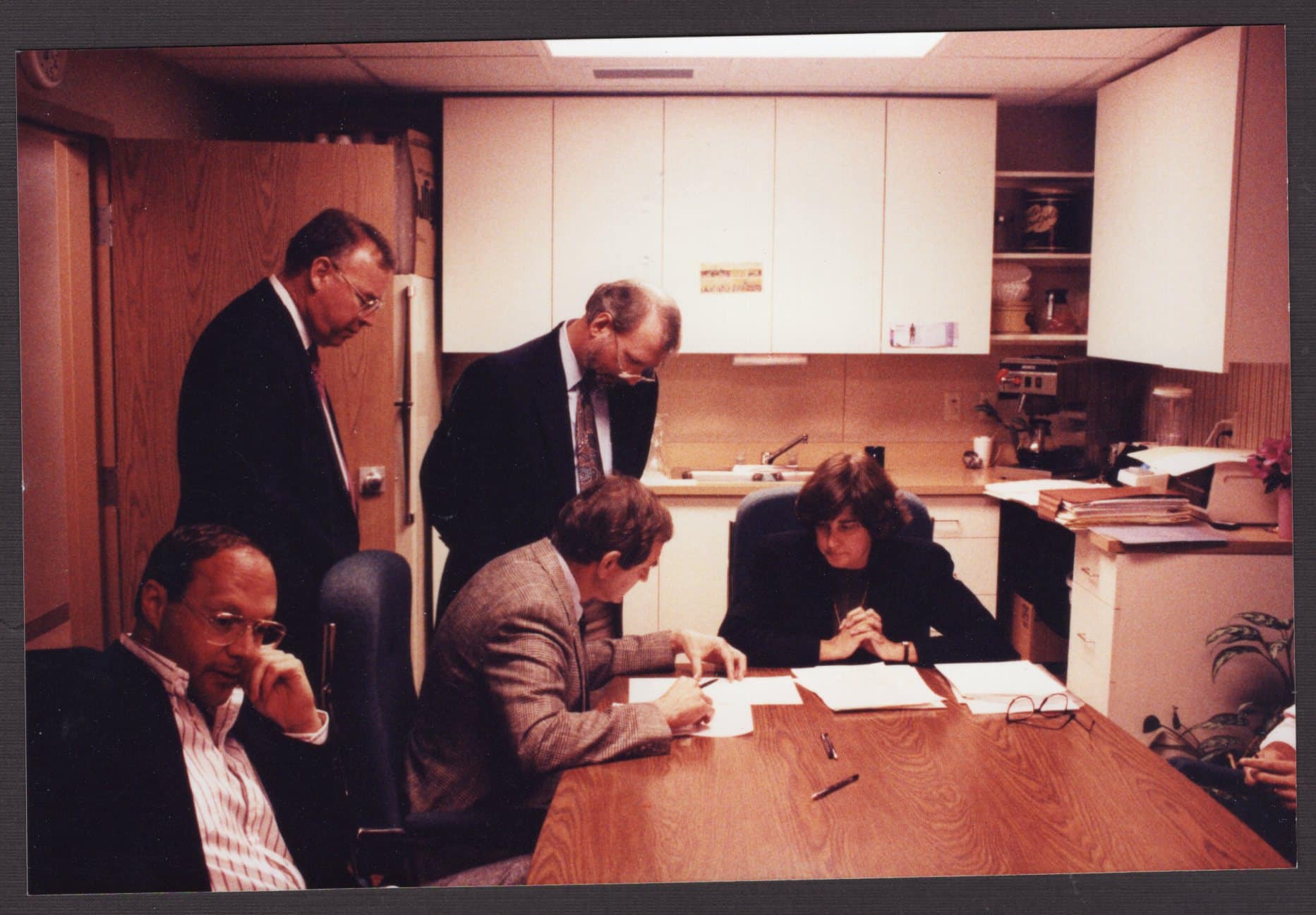 1990 Signing Paperwork